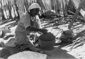 800px-Older_woman_working_on_pottery_-_NARA_-_295149